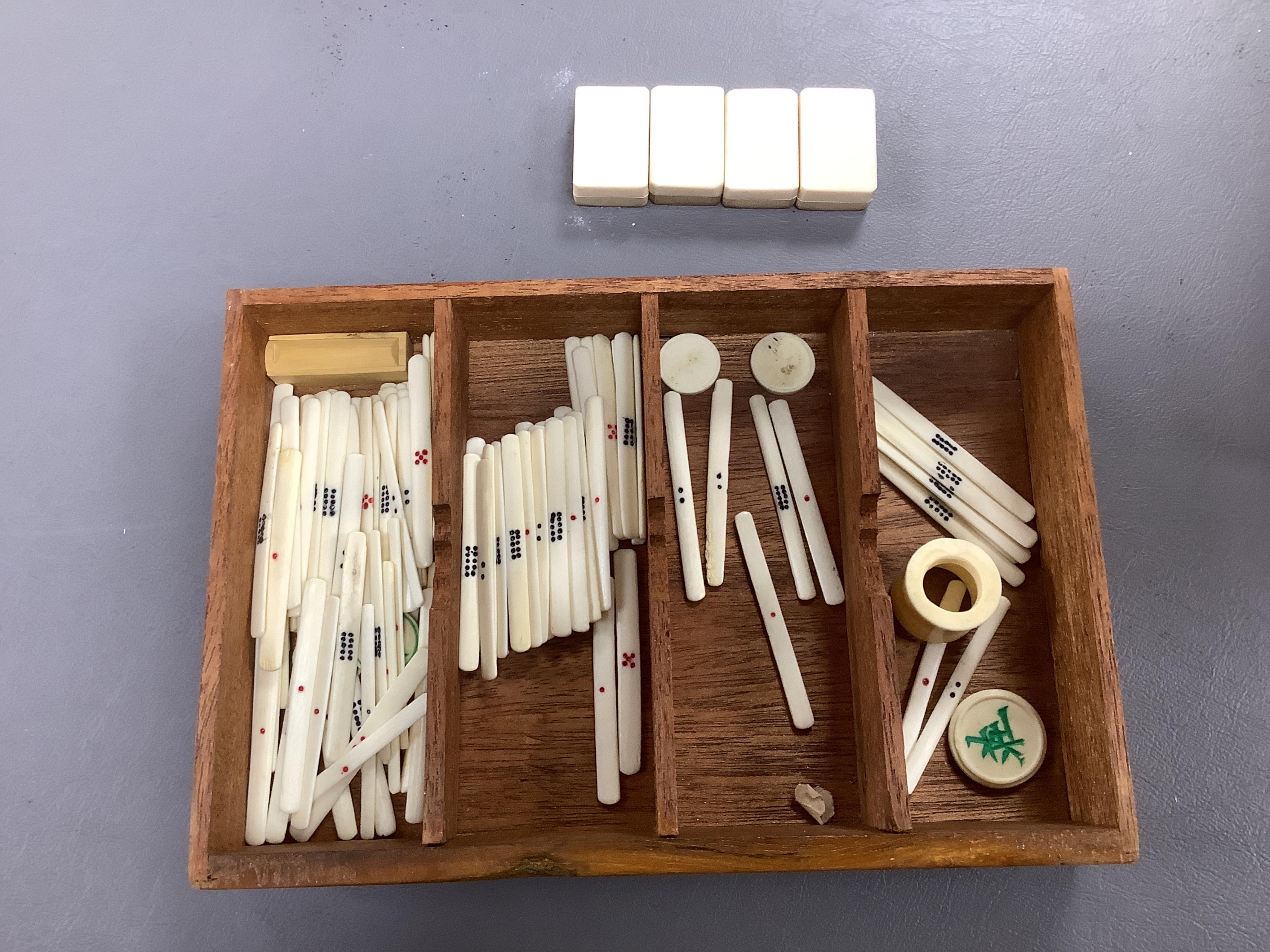 A Chinese carved boxed mahjong set and stands, box 24 cm high including handle